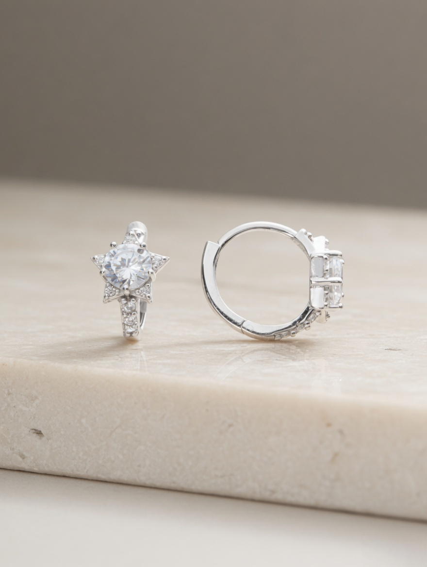 Celeste Star Huggie Earrings