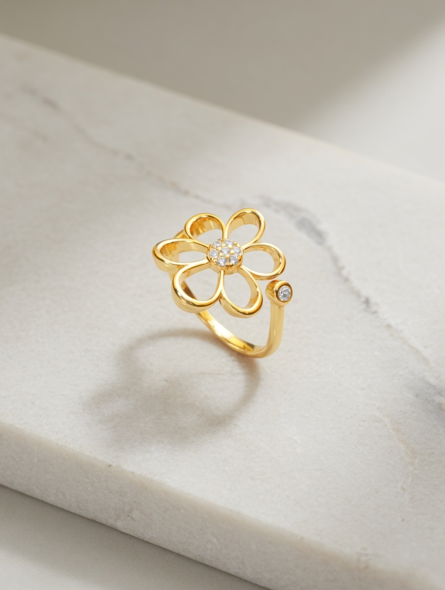 CARV. gold daisy flower ring with crystal center and open petal design studio close-up