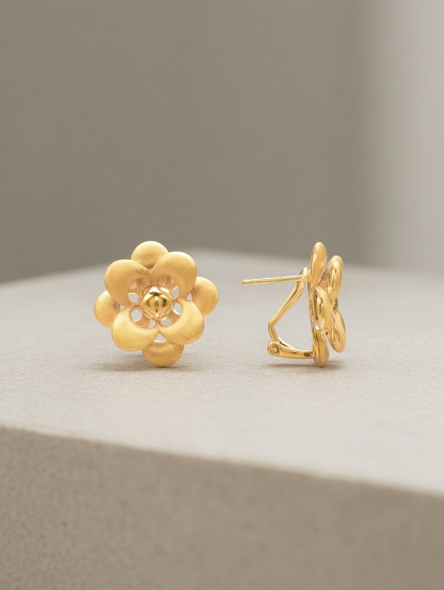CARV. gold flower stud earrings with layered petal design and side view
