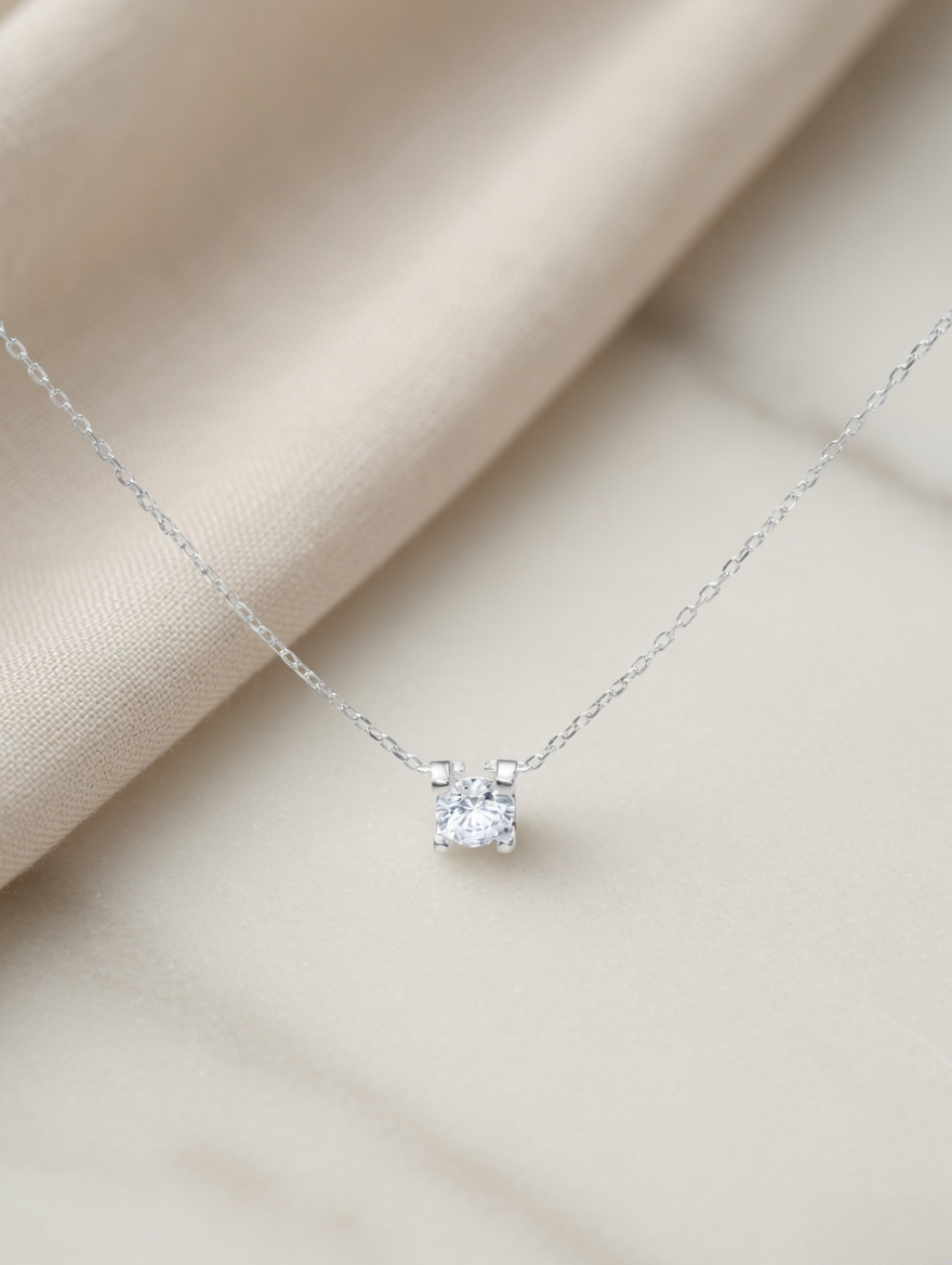 CARV. silver solitaire necklace with clear crystal pendant, square setting and fine chain display