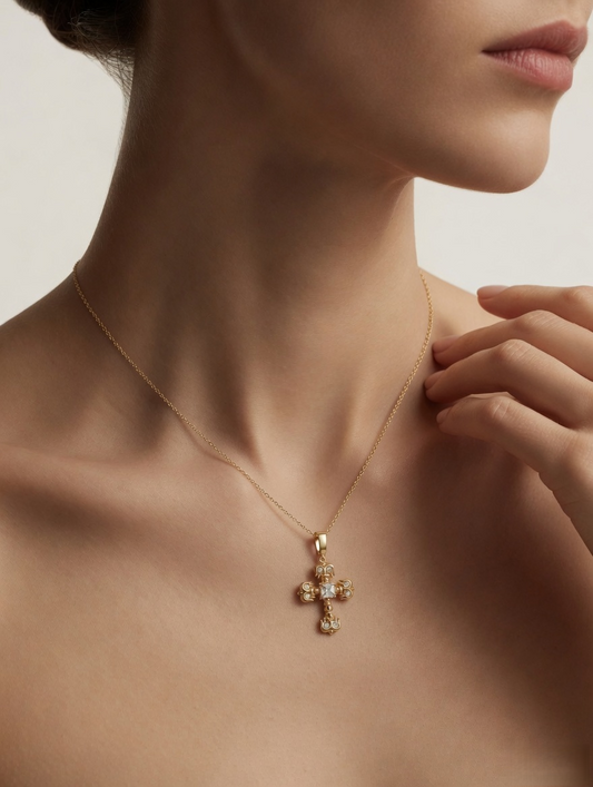 CARV. gold crystal cross pendant necklace worn on neck