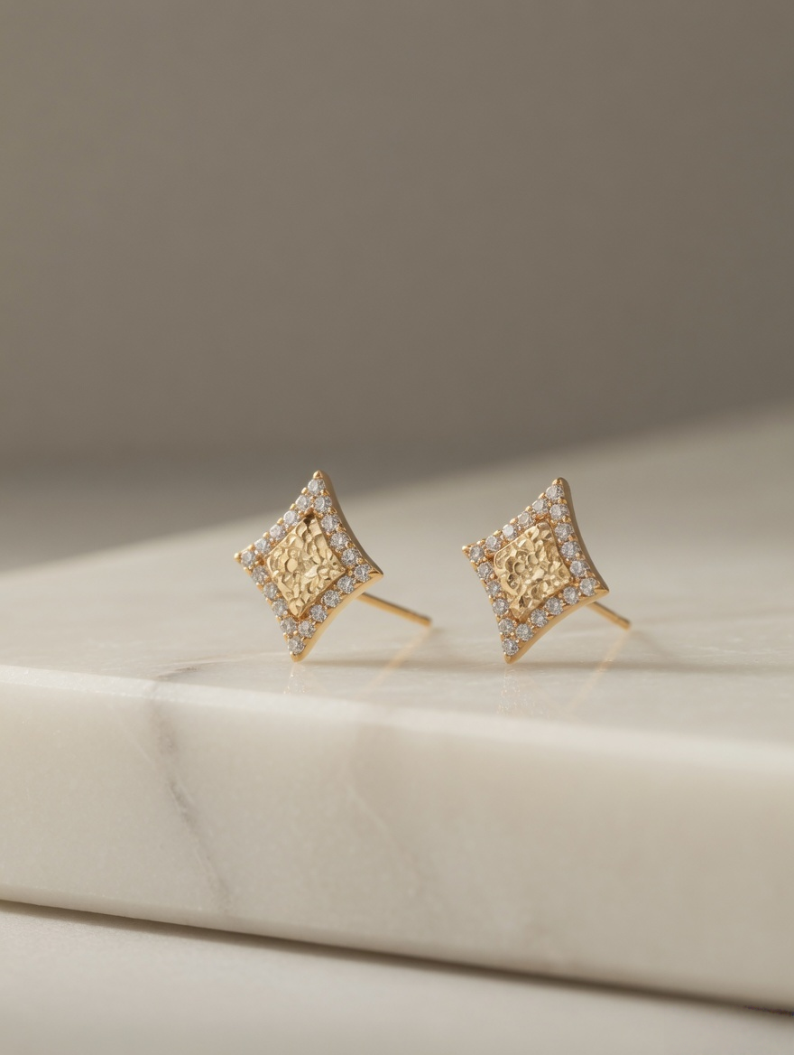 CARV. gold diamond lattice stud earrings with textured centre and pavé border product display