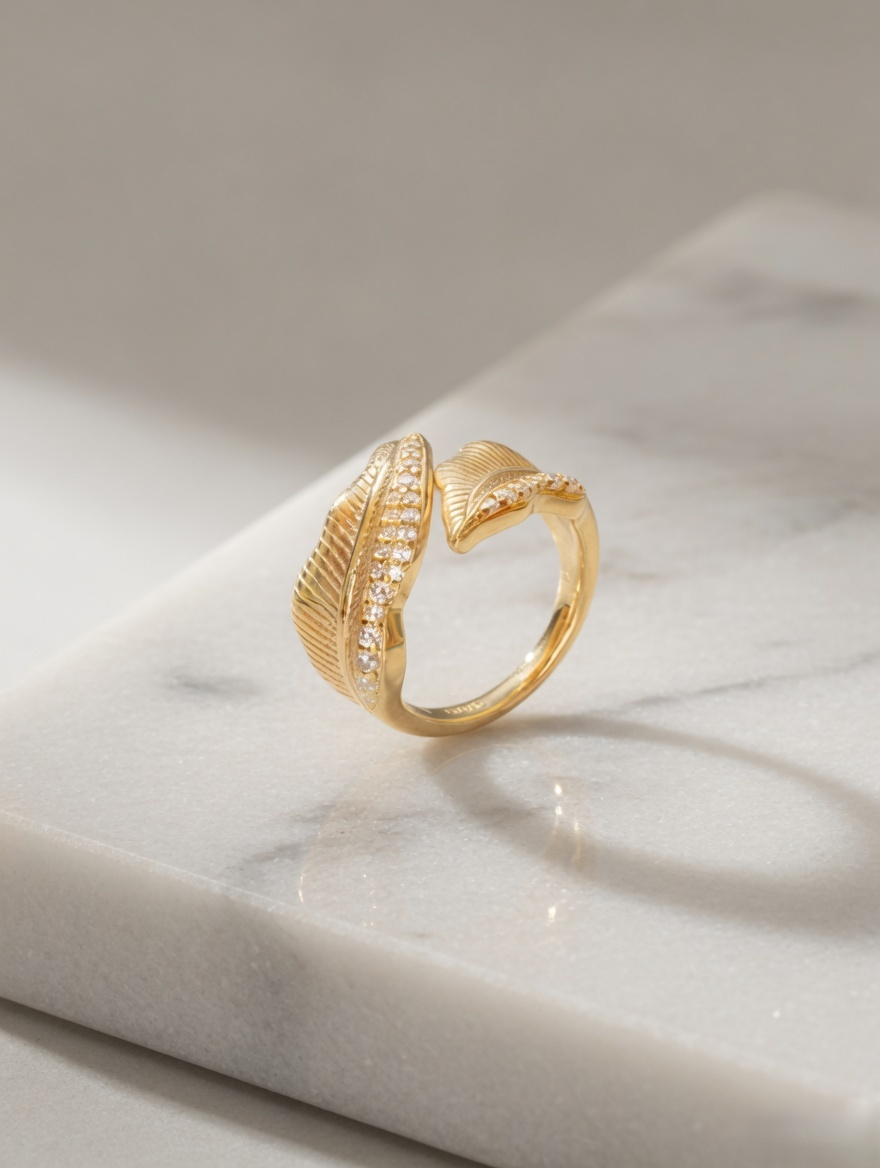 CARV. gold leaf open ring with sculptural band, layered leaf shape and pavé detail
