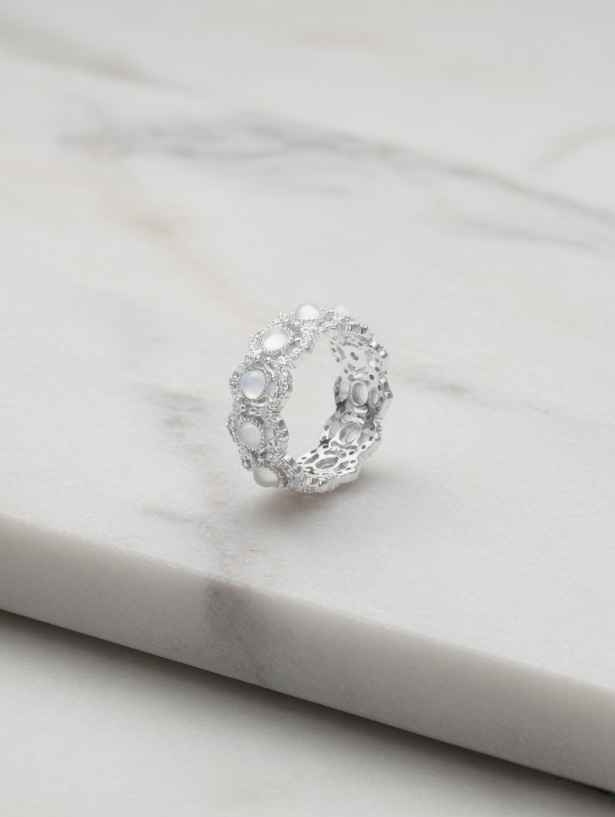 CARV. silver chalcedony cluster ring with translucent stone cabochons, openwork band and crystal accents