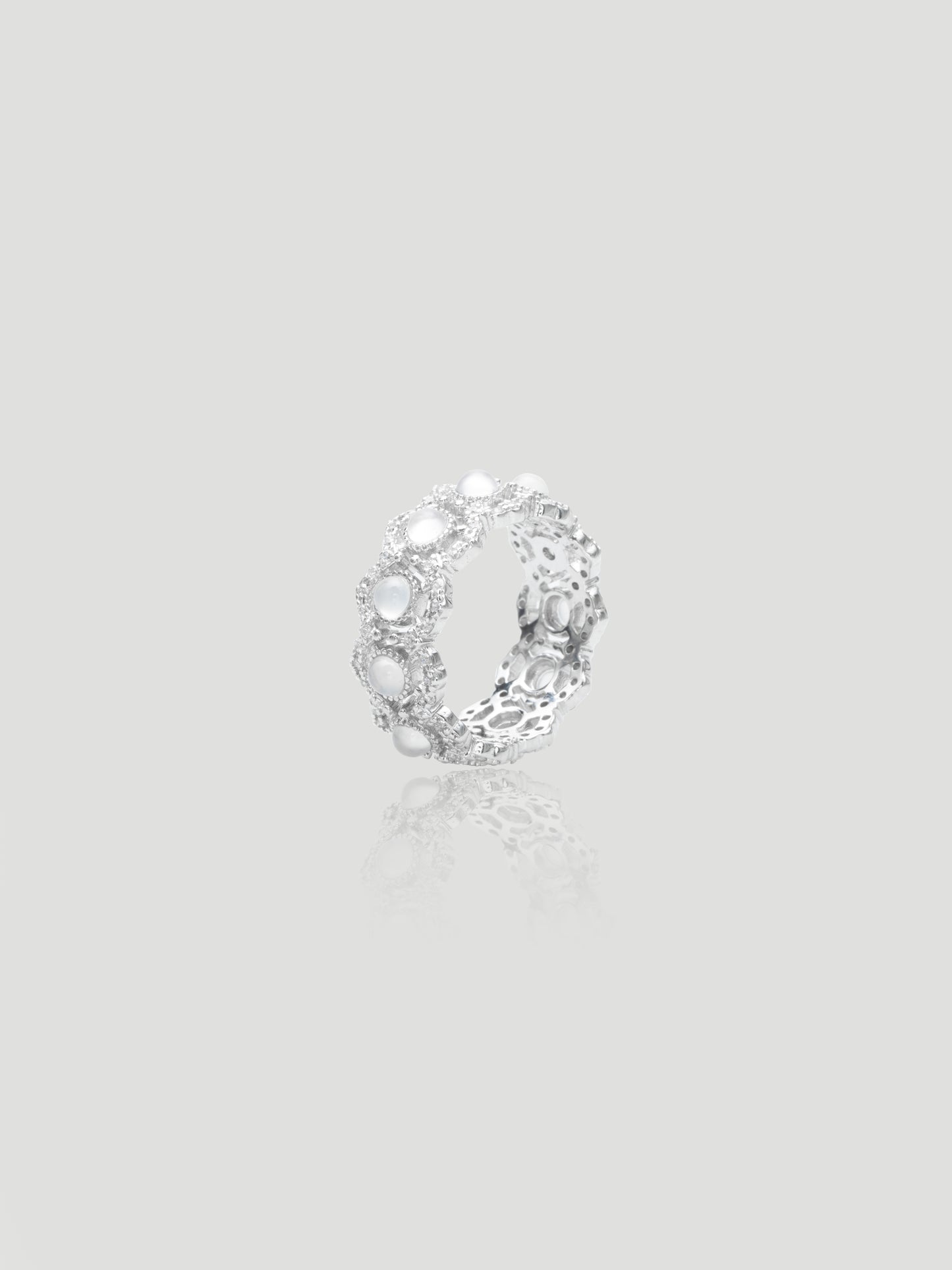 CARV. silver chalcedony cluster ring with translucent stone cabochons, openwork band and crystal accents